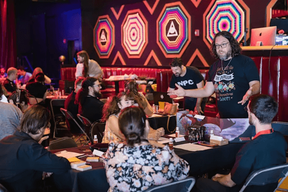 A lively gathering at a themed event, with people engaged in conversation and activities in Santa Clara, California.