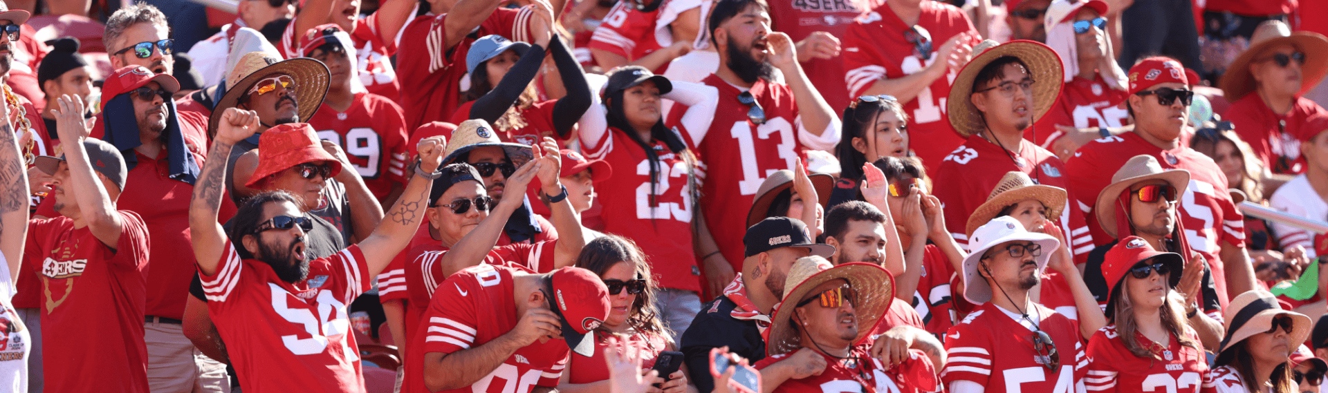 September Events in Santa Clara 2026 A crowd of fans wearing red San Francisco 49ers jerseys cheering at a stadium in Santa Clara, California.
